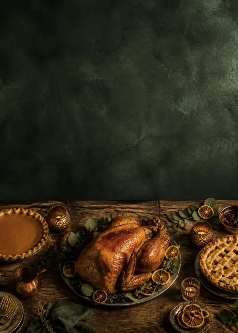 Gathered Together invitation design: Forest-green wall over a rustic feast